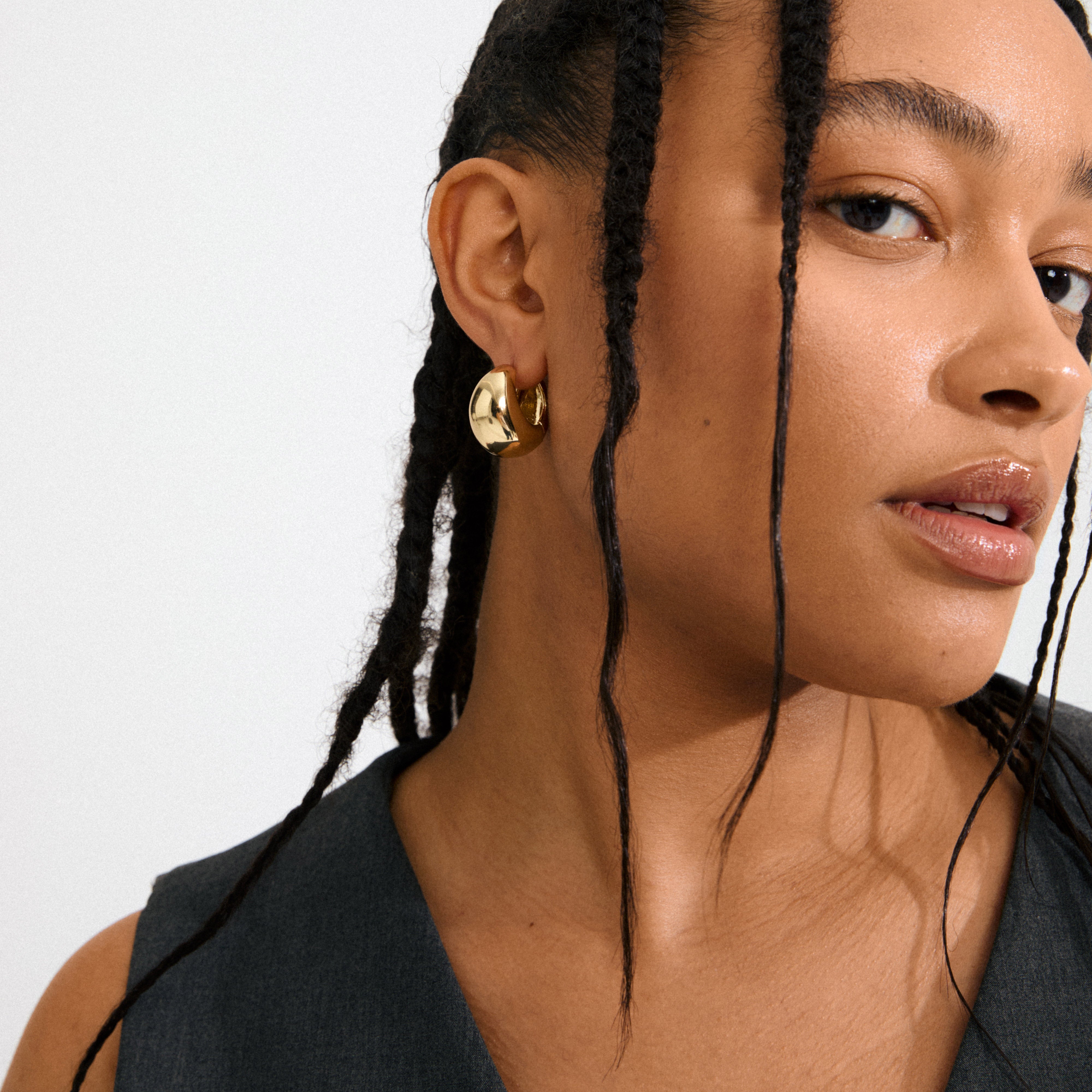 Medium-brown skin with long braids wearing Pilgrim's FREE hoops 168一分钟极速赛车--|实时赛果直播视频 gold-plated; chunky, uneven design adds edgy elegance.